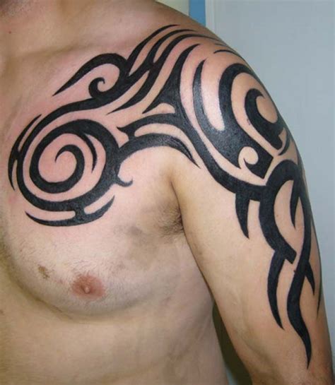 forearm tattoos tribal designs|shoulder tribal tattoo male.